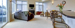 Large modern luxury apartment living room with kitchen bar.